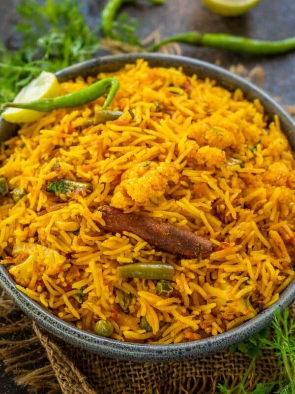 Vegetable Masala Rice is a delicious one-pot recipe prepared with rice, vegetables, and spices. Serve it with plain yogurt or raita for a comforting meal (vegan, gluten-free).