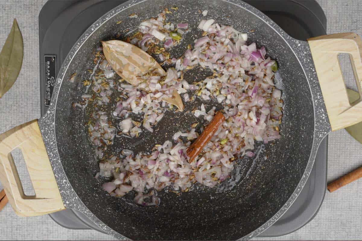 Onions added to the pan.