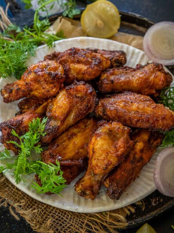 Tandoori Chicken Wings is a delicious Indian appetizer made using a few simple ingredients. Make them in an air fryer or an oven using my easy recipe (gluten-free).