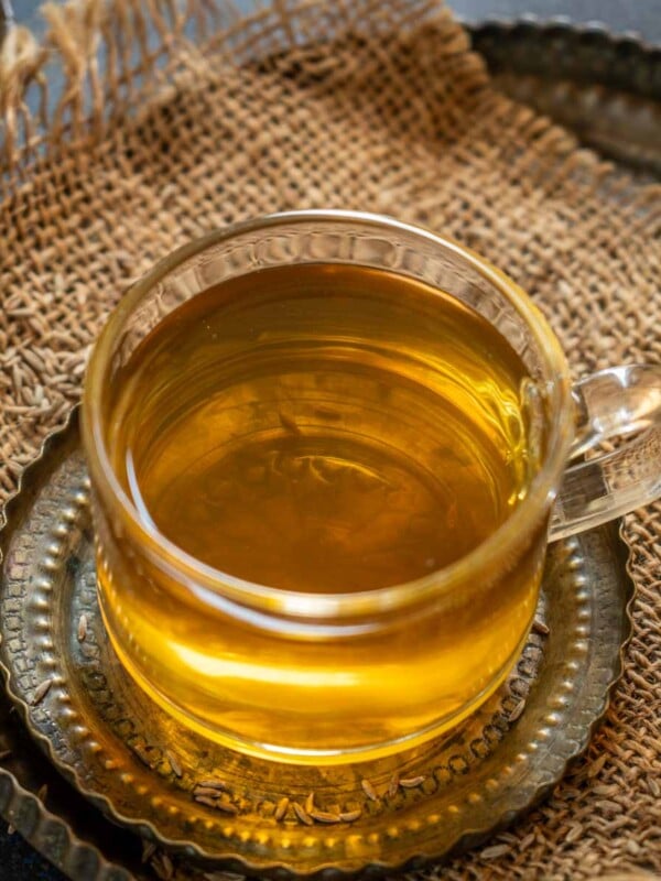 Make a refreshing cup of Herbal Cumin Seeds Tea (Jeera Water) using my easy recipe. It is great for digestive health and weight loss (vegan, gluten-free).