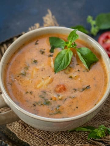 Make hearty and healthy Italian-style Creamy Tomato Florentine Soup using my easy recipe. It is great to serve as a light meal.