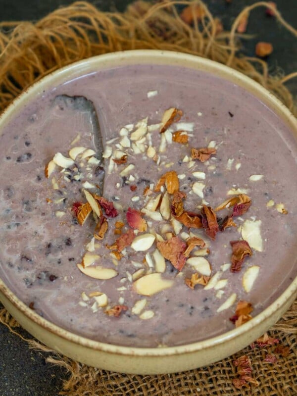 Black Rice Kheer (Chak Hao Amubi Kheer) is a delicious, creamy North Eastern Indian dessert made with black rice, milk, and nuts. Serve it for festivals or special occasions. (vegetarian, gluten-free, and can be made vegan).