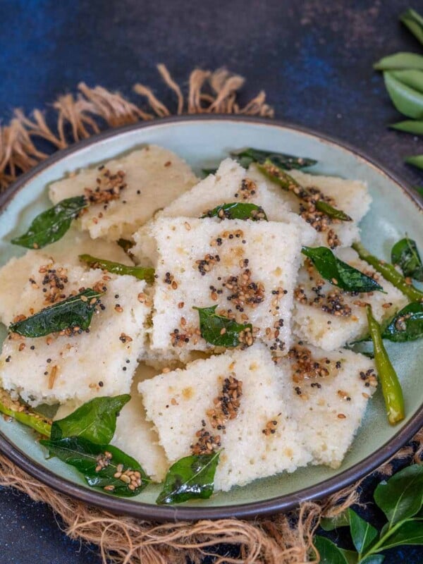 Instant Rava Dhokla is a Gujarati snack prepared with semolina, yogurt, and other ingredients. Serve it with green chutney and masala chai.