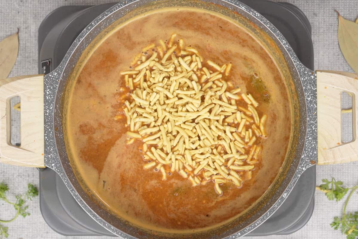 Sev added to the pan.
