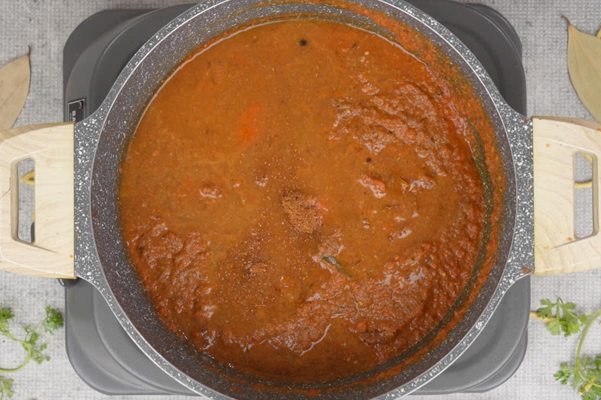 Garam masala powder and water added to the pan.