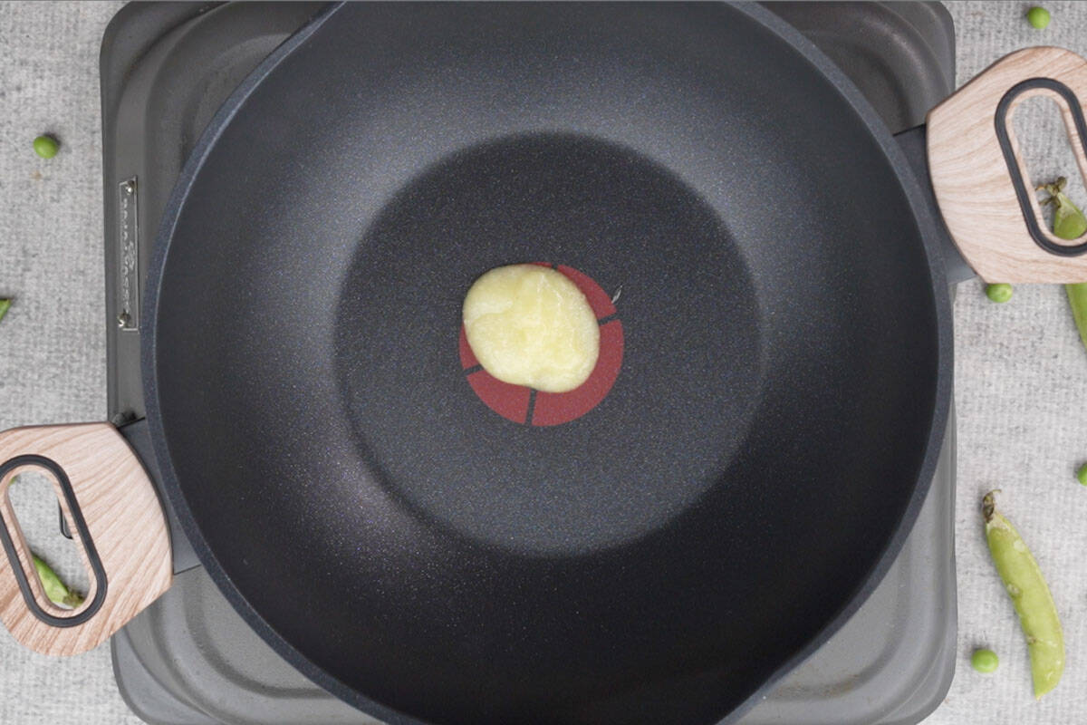 Ghee added to a pan.