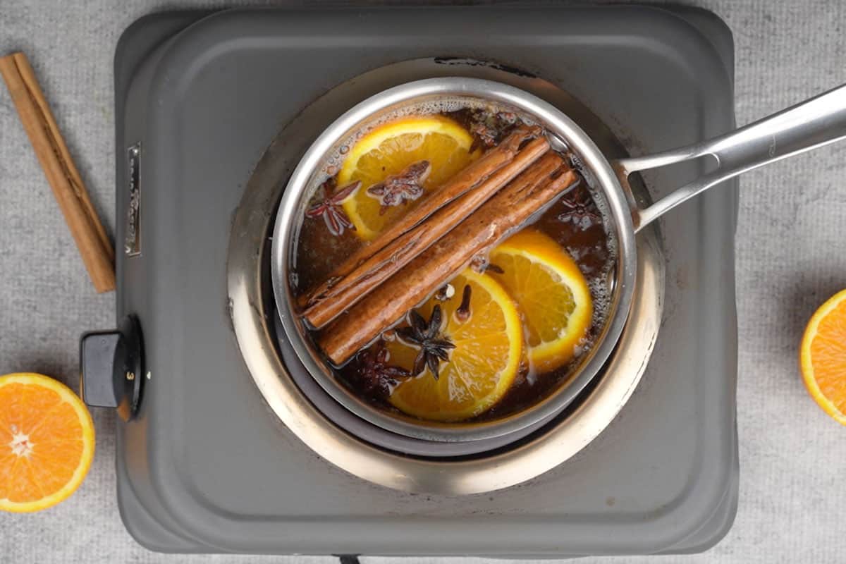 All the ingredients except rum simmering in a pan.