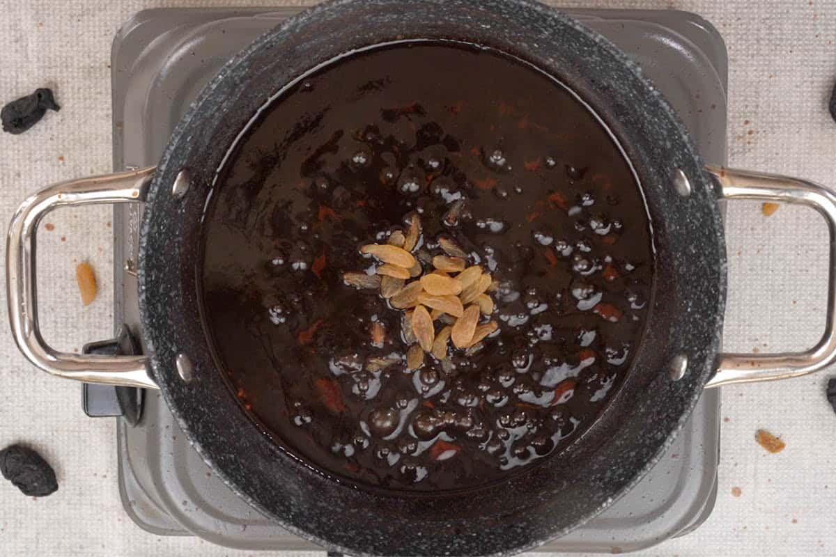 Raisins added to the pan.