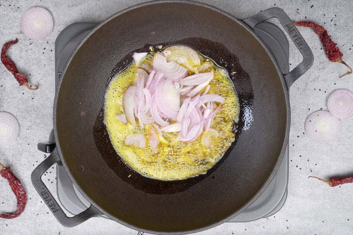 Onions added to the pan.