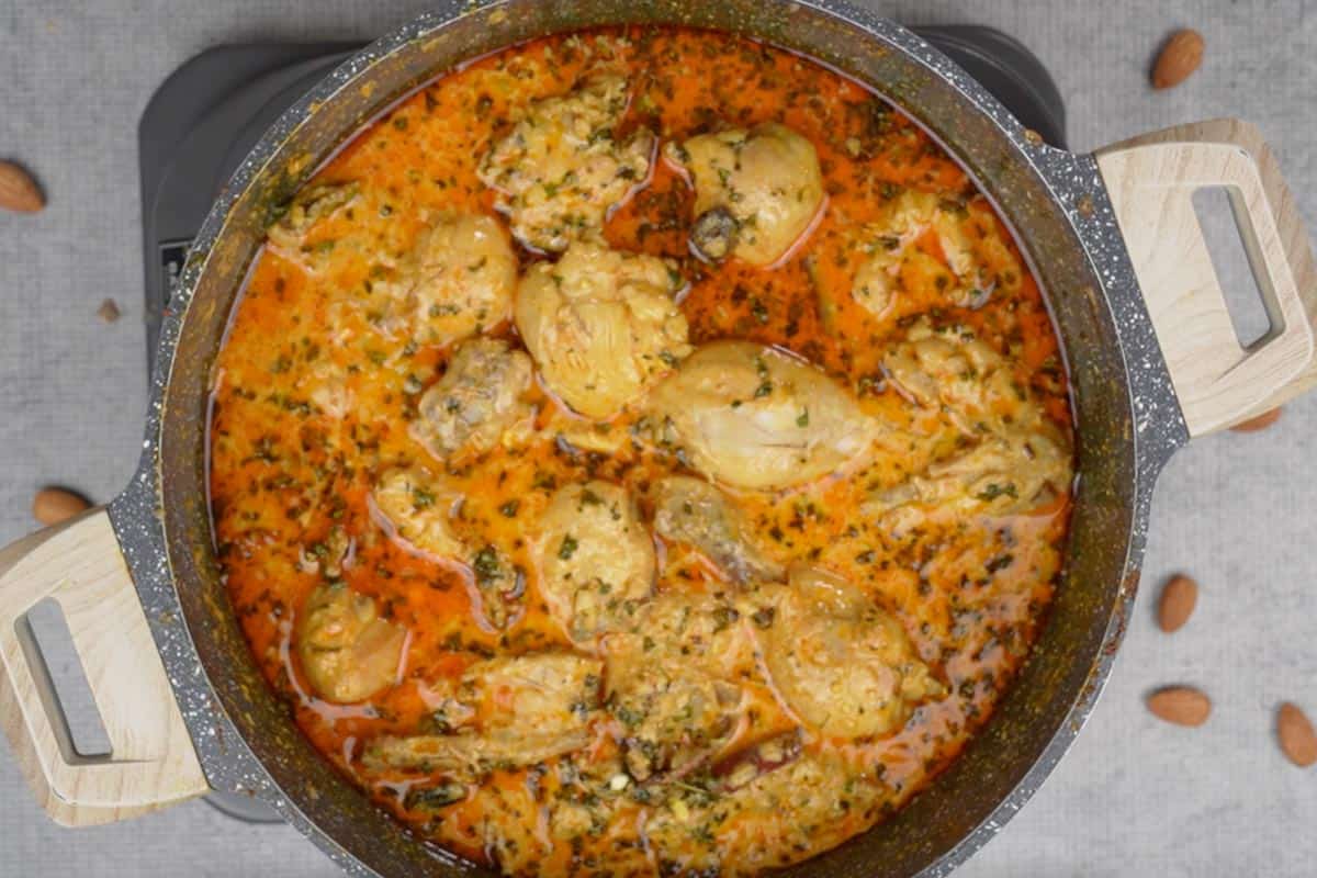 Ready badami chicken curry in the pan.
