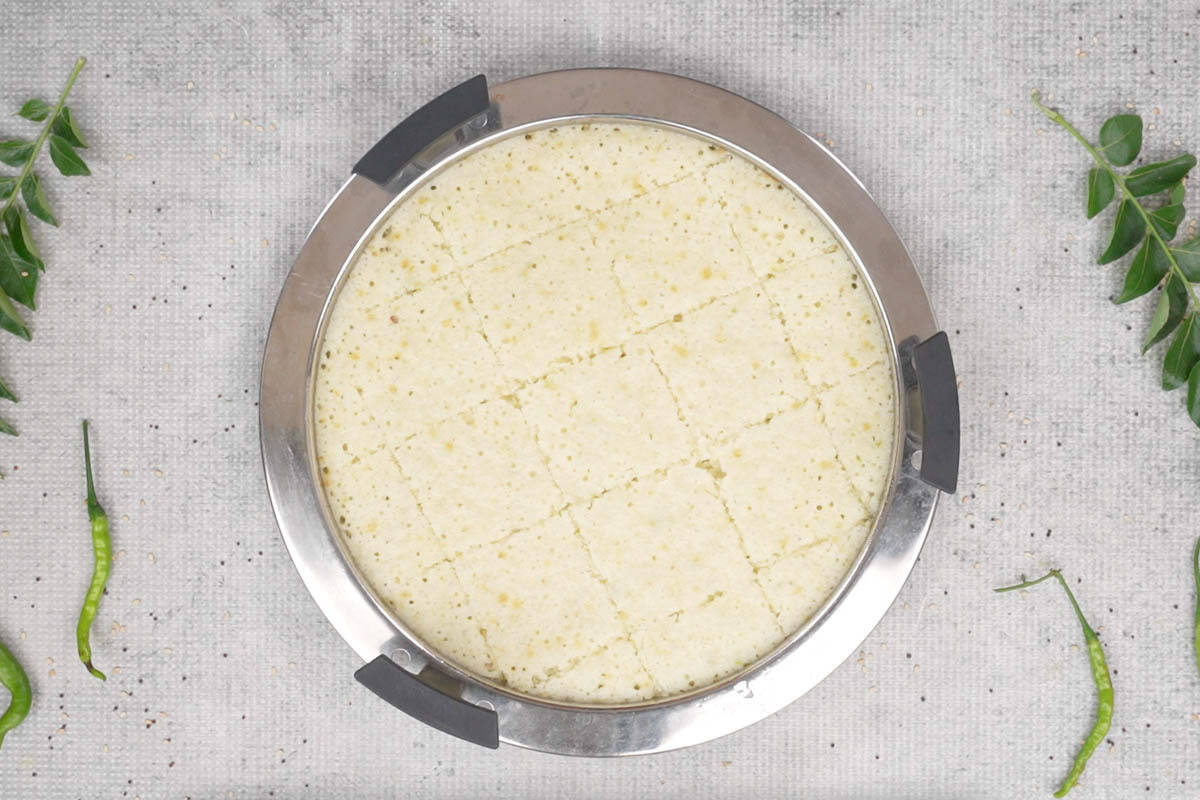 Rava dhokla cut onto small pieces.