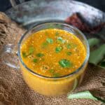 Coconut Milk Rasam (Thengai Pal Rasam) is a delicious twist on the classic rasam recipe. Make this comforting dish at home using my easy recipe.