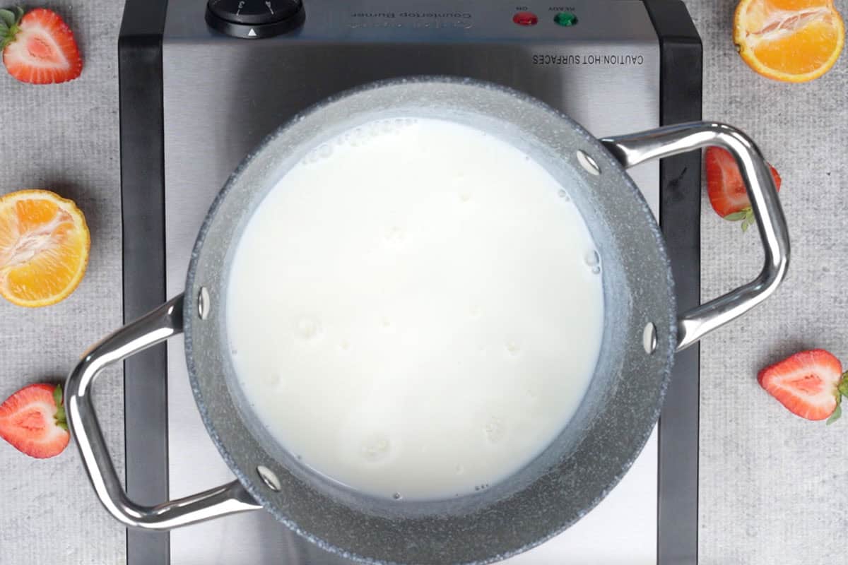 Milk heating in a pan.