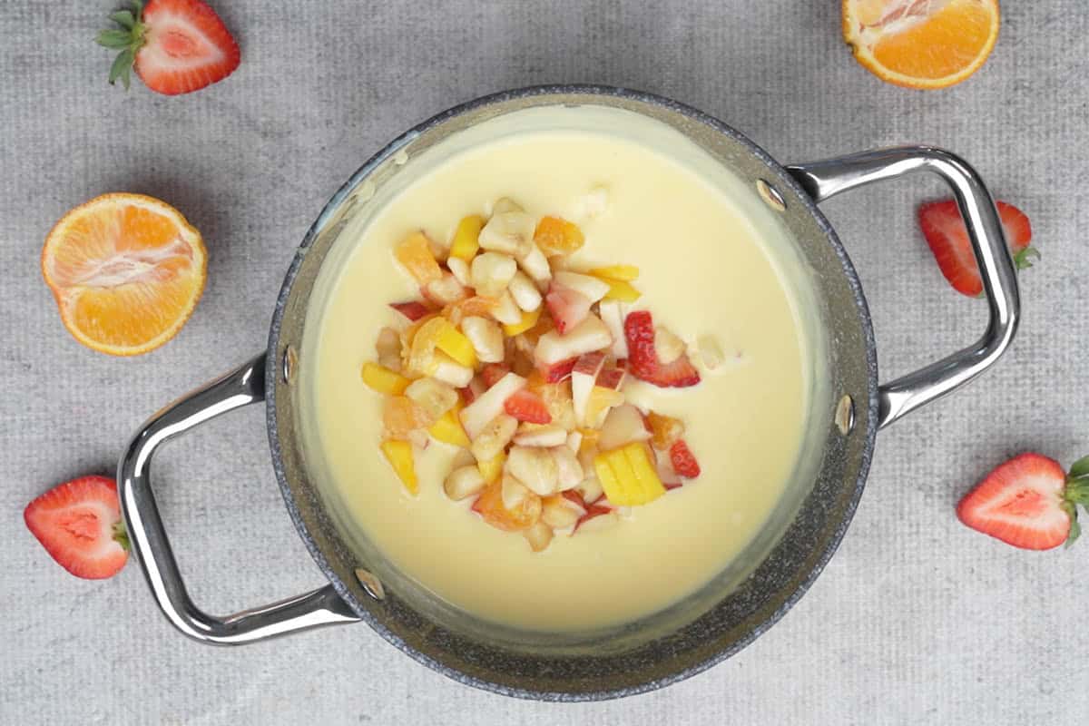 Fruits added to the pan.
