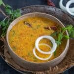 Hyderabadi khatti dal served in a bowl.