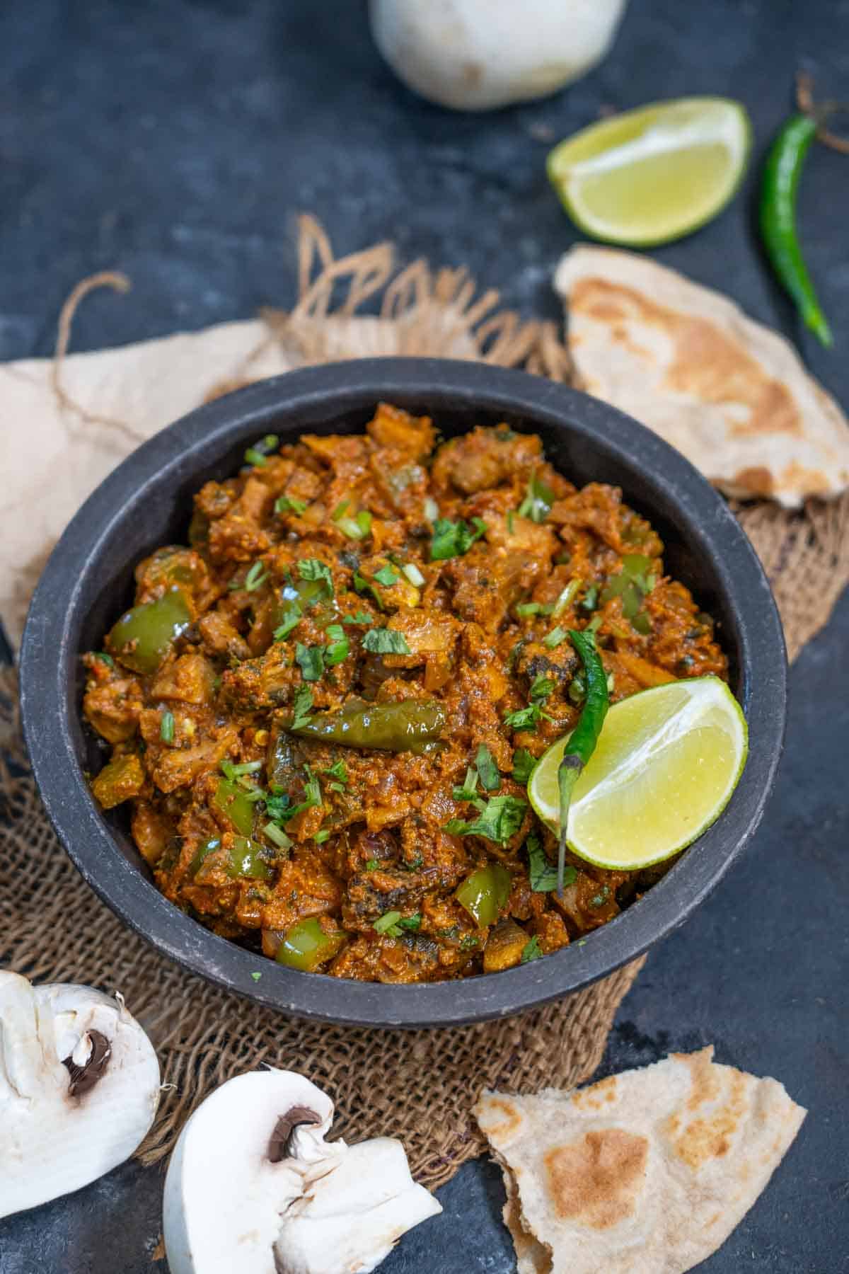 Mushroom masala served in a bowl.