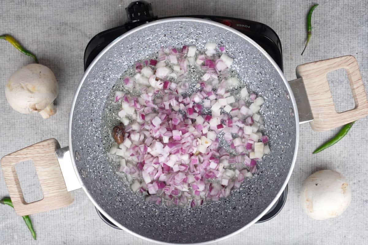 Onions added to the pan.