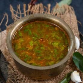Milagu rasam served in a bowl.