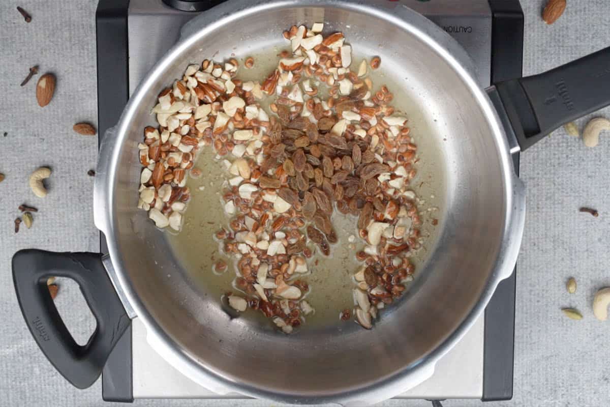 Raisins added to the cooker.