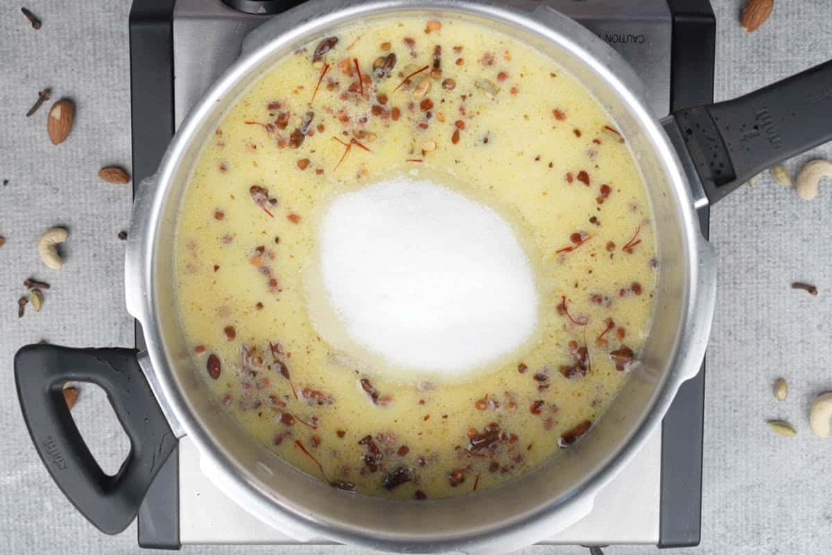 Sugar added to the cooker.