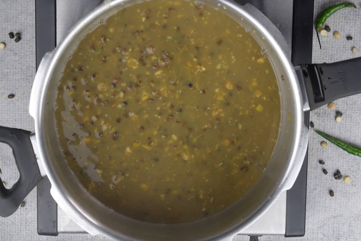 Cooked lentils in the pressure cooker.