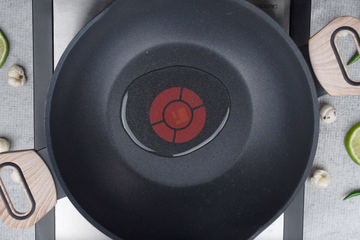 Oil heating in a pan.