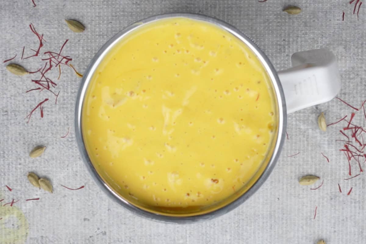 Ready mango lassi in the blender.