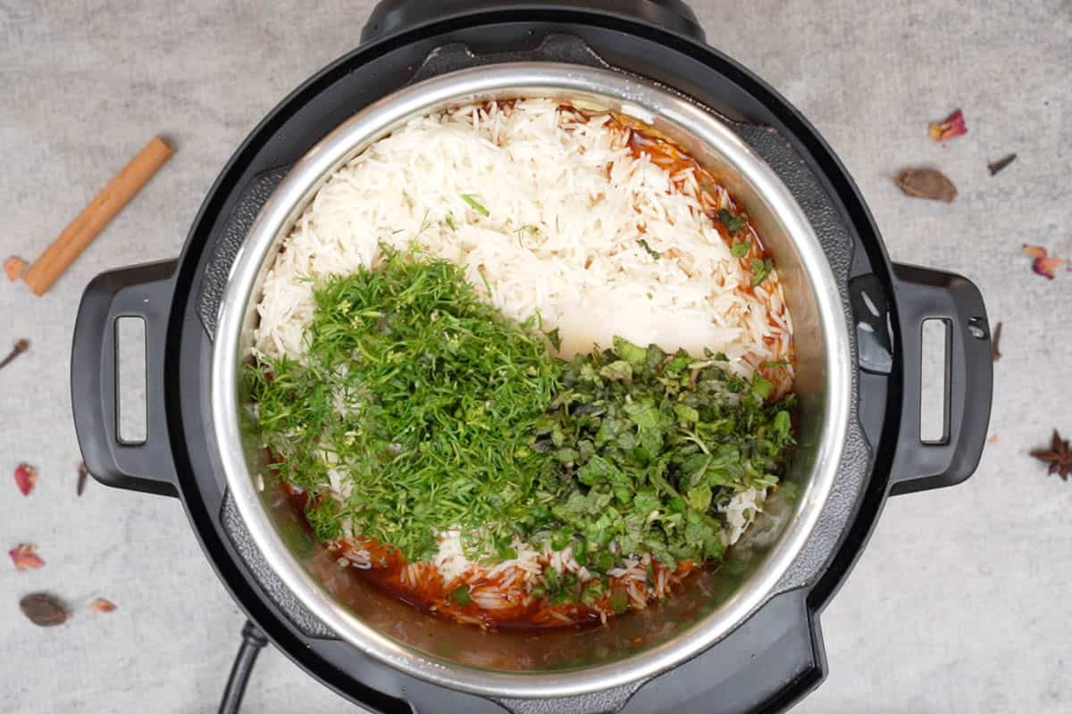 Mint, cilantro, dried rose petals aded to the instant pot.
