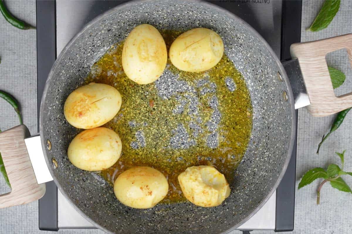 Seared eggs in the pan.