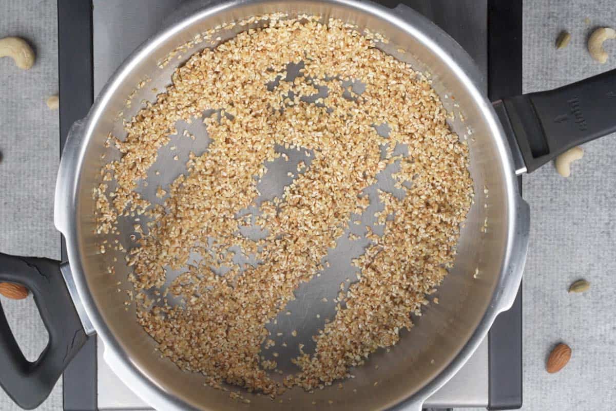 Roasted dalia in a pressure cooker.