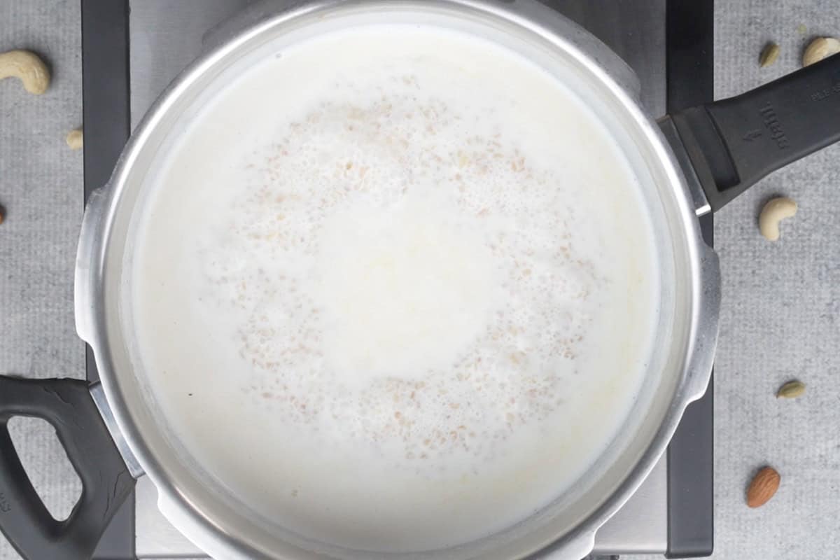 Milk added to the cooker.