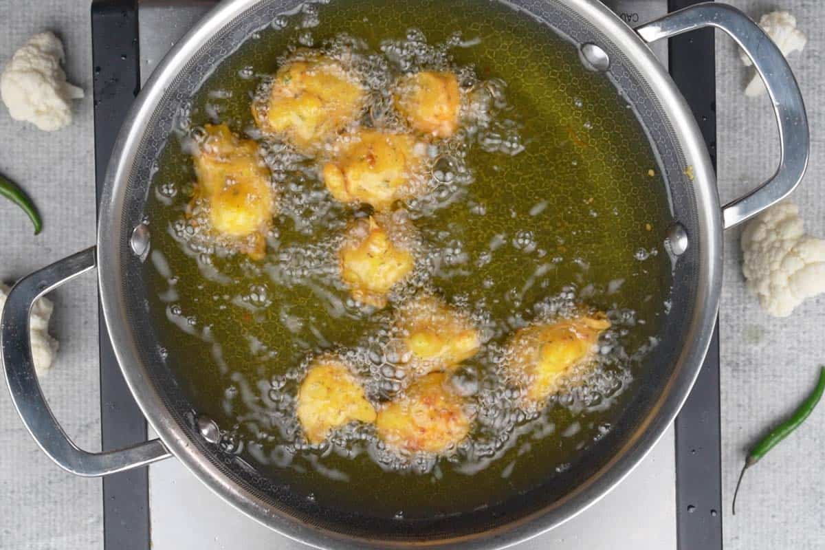 Frying the cauliflower paora for the second time.