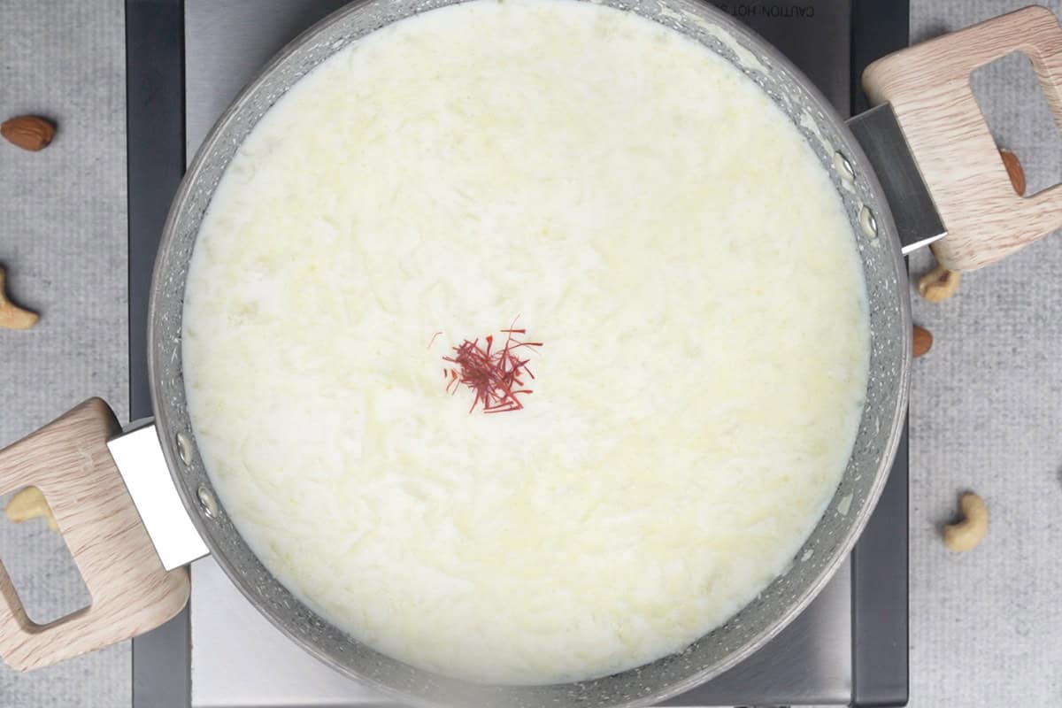 Milk and saffron added to the pan.